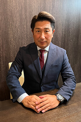 代表取締役社長 佐藤 賢